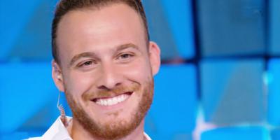 كرم بورسين يكشف متى بدأت علاقته بـ هاندا ارتشيل