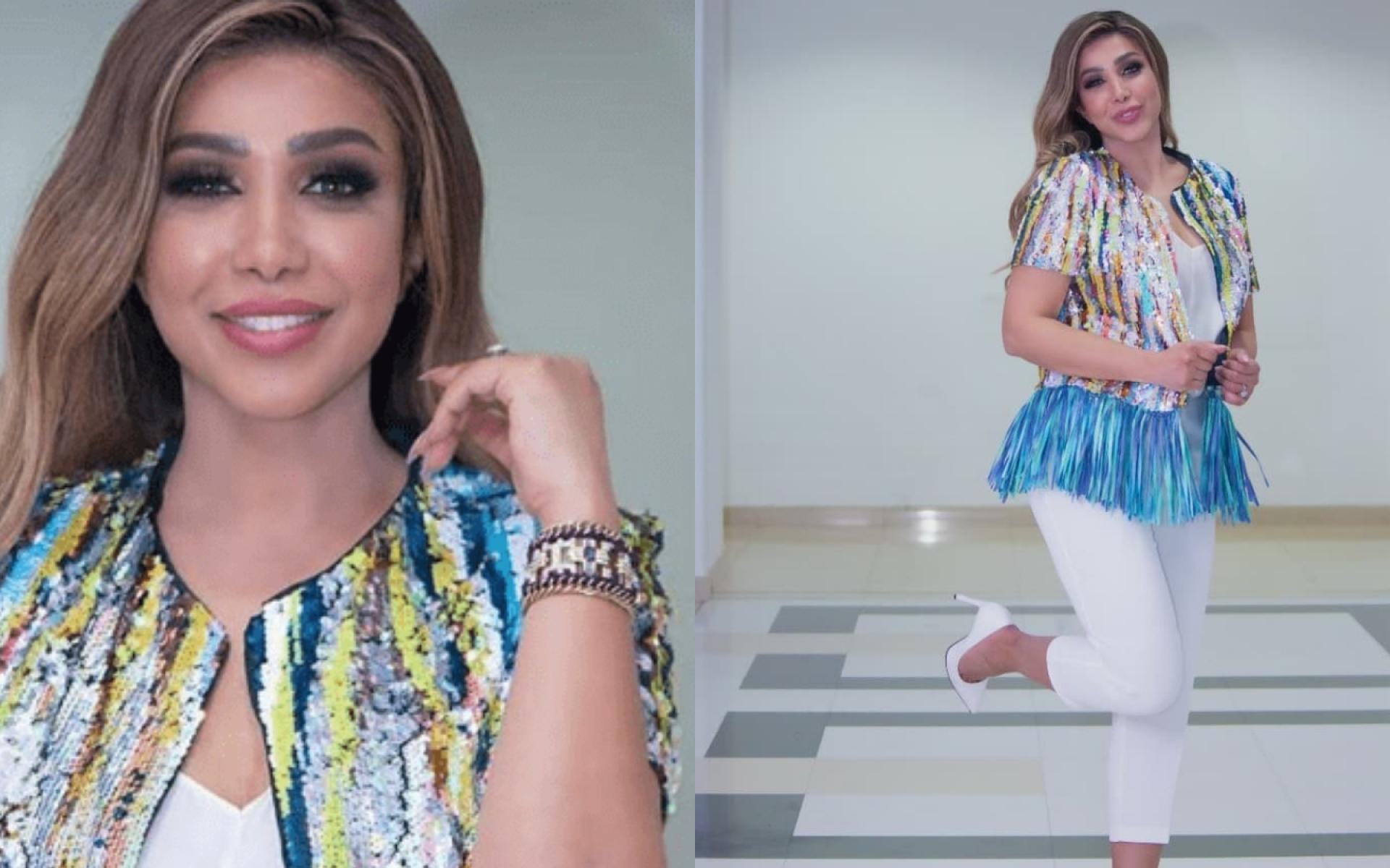 جاكيت بألوان جميلة ربيعية مع توب وبنطلوت باللون الأبيض لإبراز ألوان الجاكيت